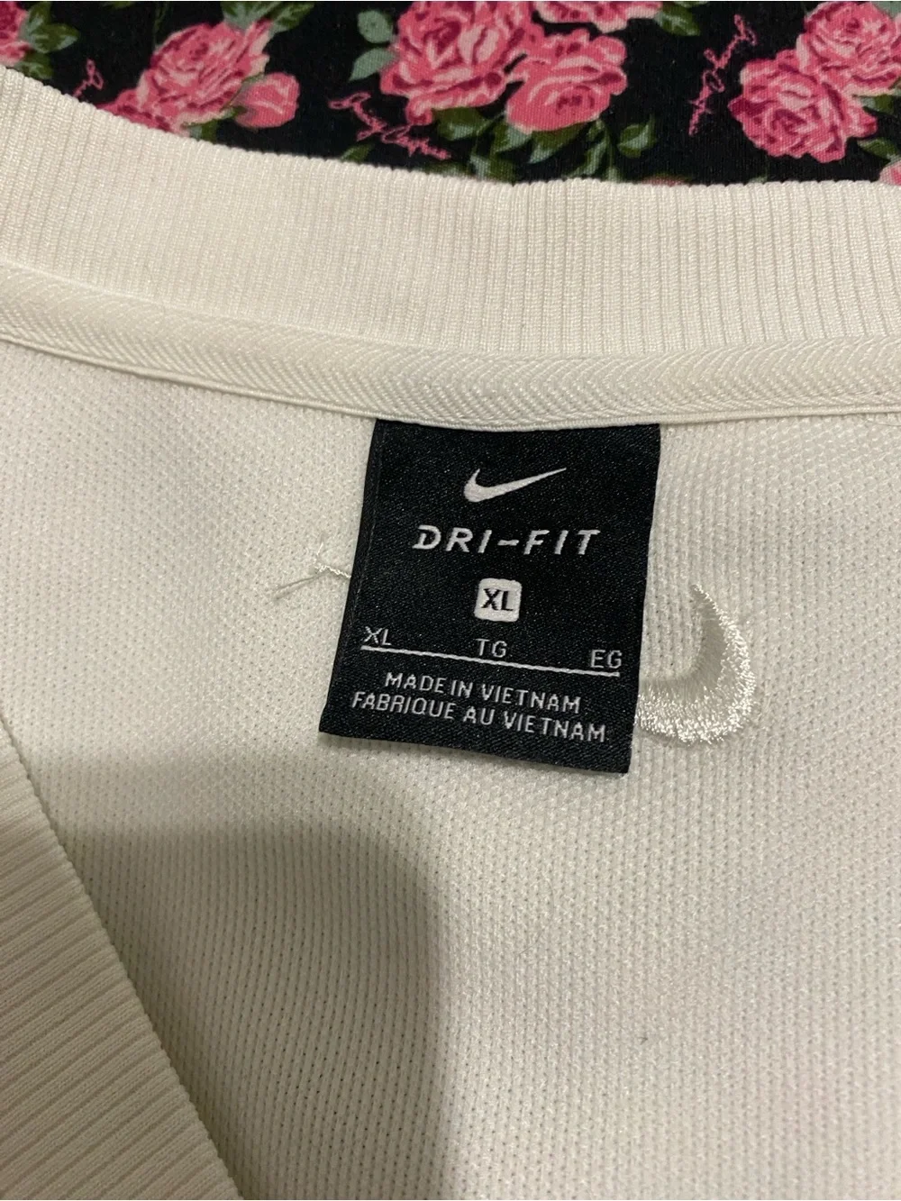 Nike Cream V‑Neck Sleeveless Knit Top Golfing